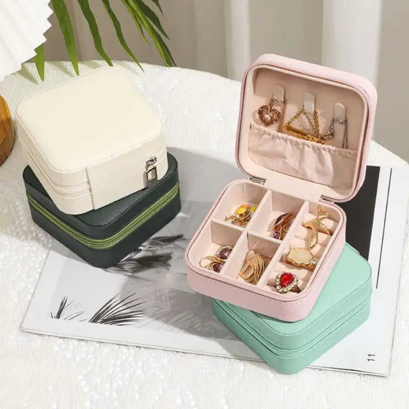 "Ultimate Travel Jewelry Organizer: Luxe Leather Case for Rings, Earrings, and Necklaces"