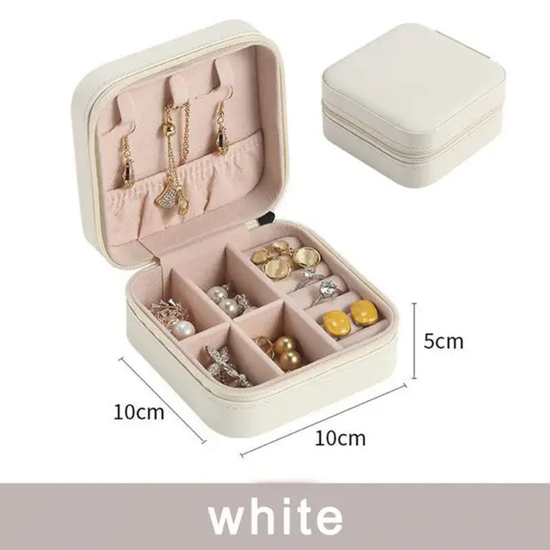 "Ultimate Travel Jewelry Organizer: Luxe Leather Case for Rings, Earrings, and Necklaces"