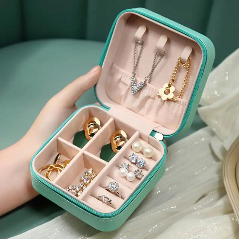 "Ultimate Travel Jewelry Organizer: Luxe Leather Case for Rings, Earrings, and Necklaces"